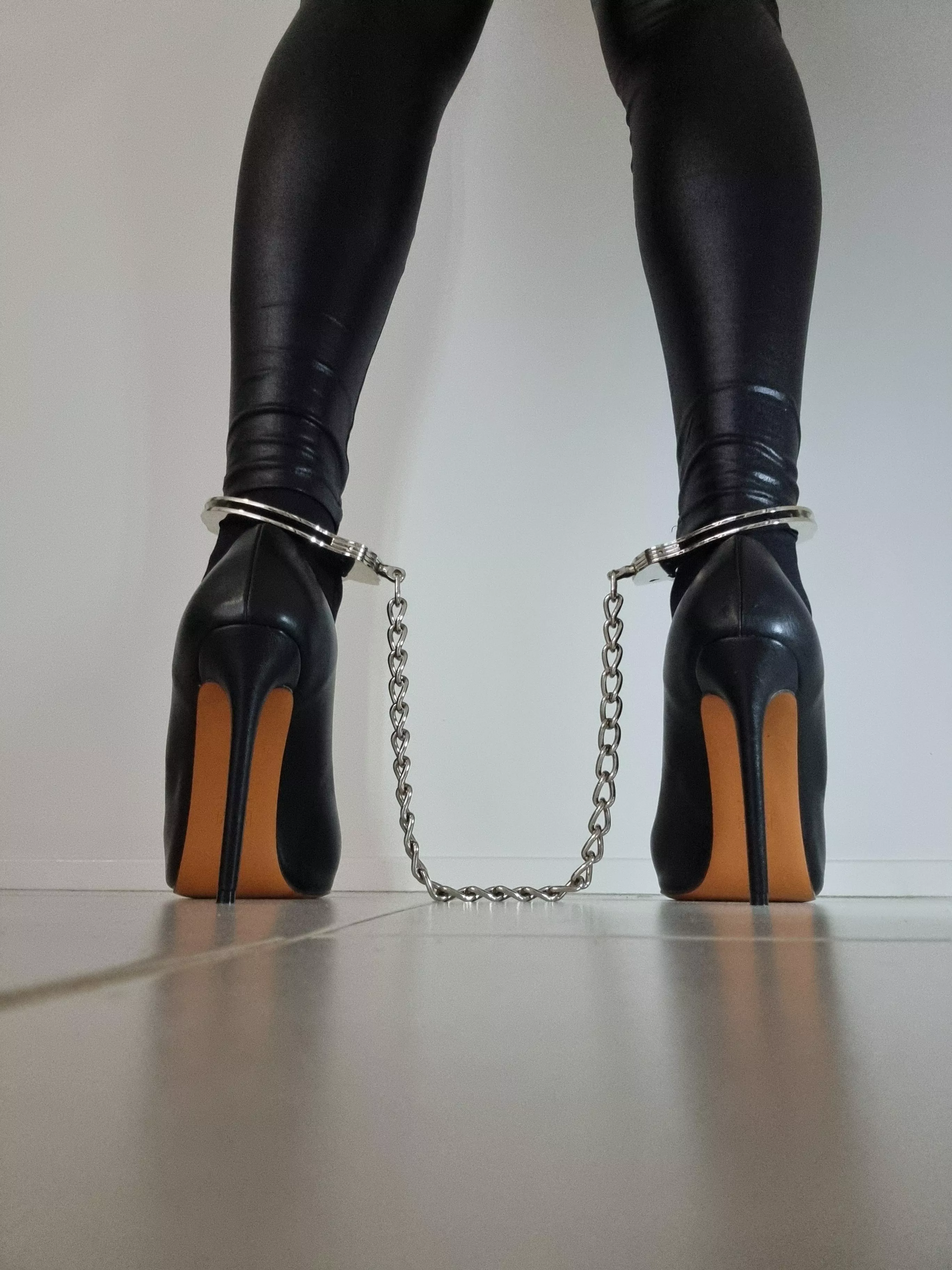 Cuffed in Heels posted by CelebsinHeels01