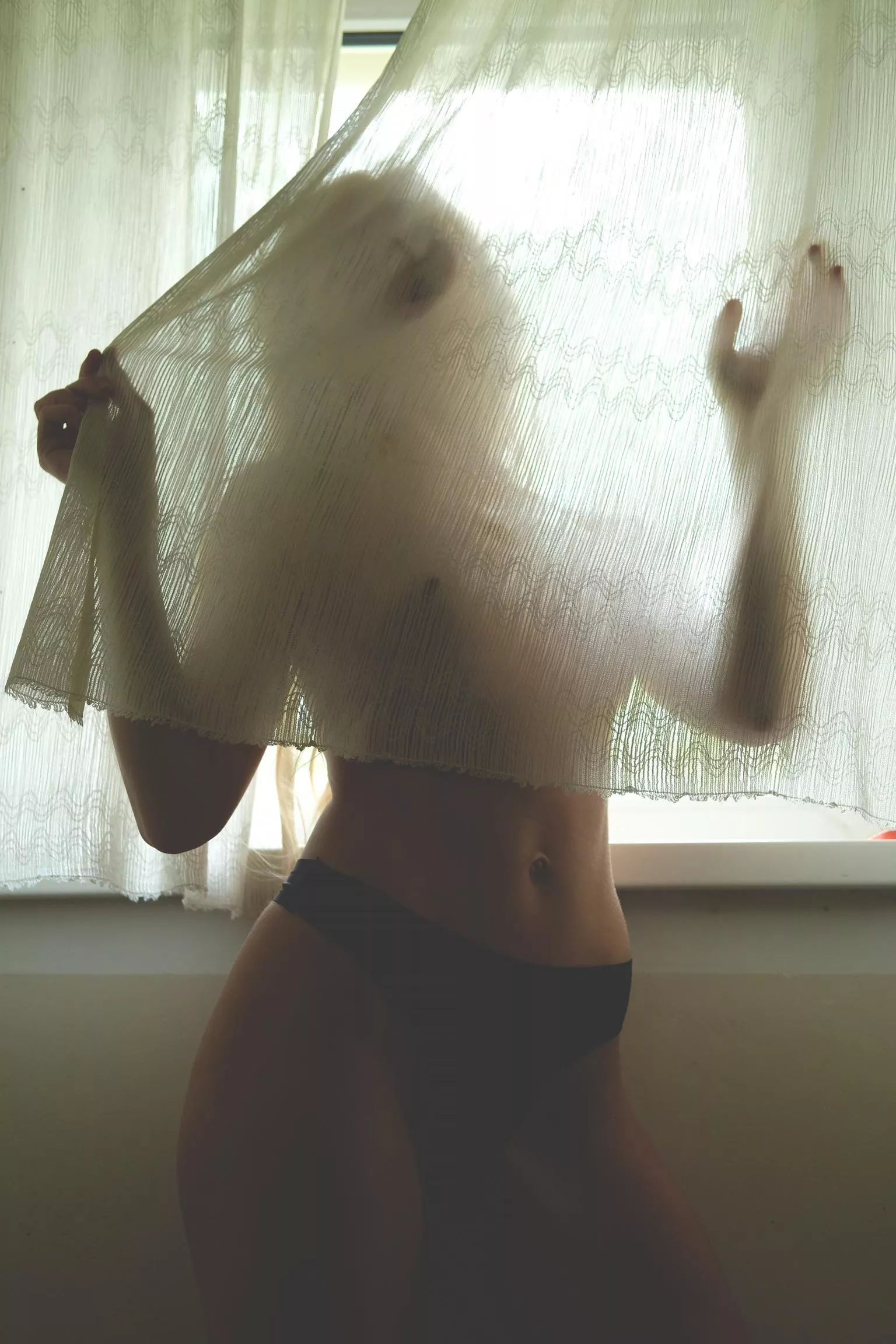 Behind it posted by Artanni55