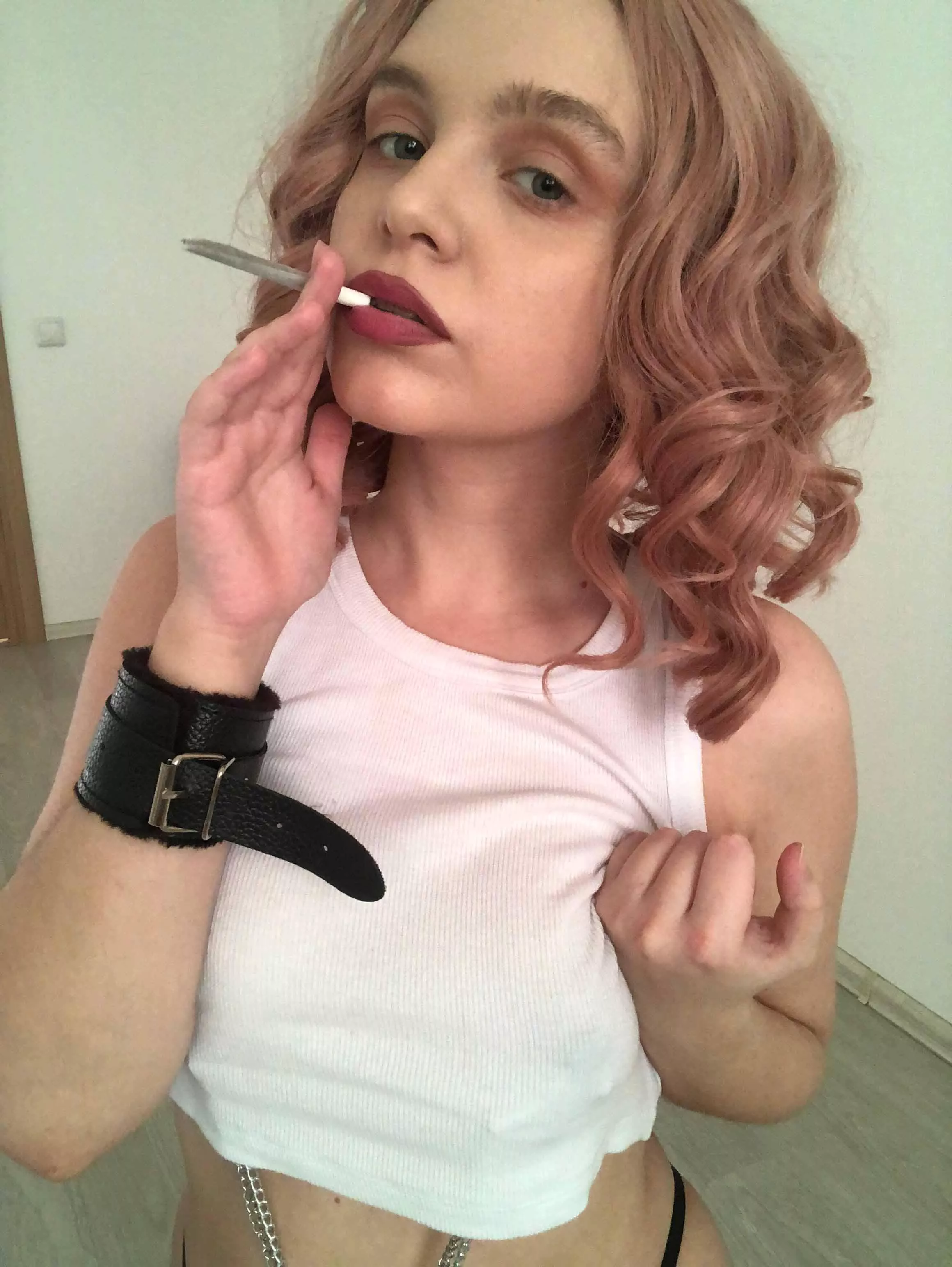 Handcuffed and smoking! posted by naughtykitti