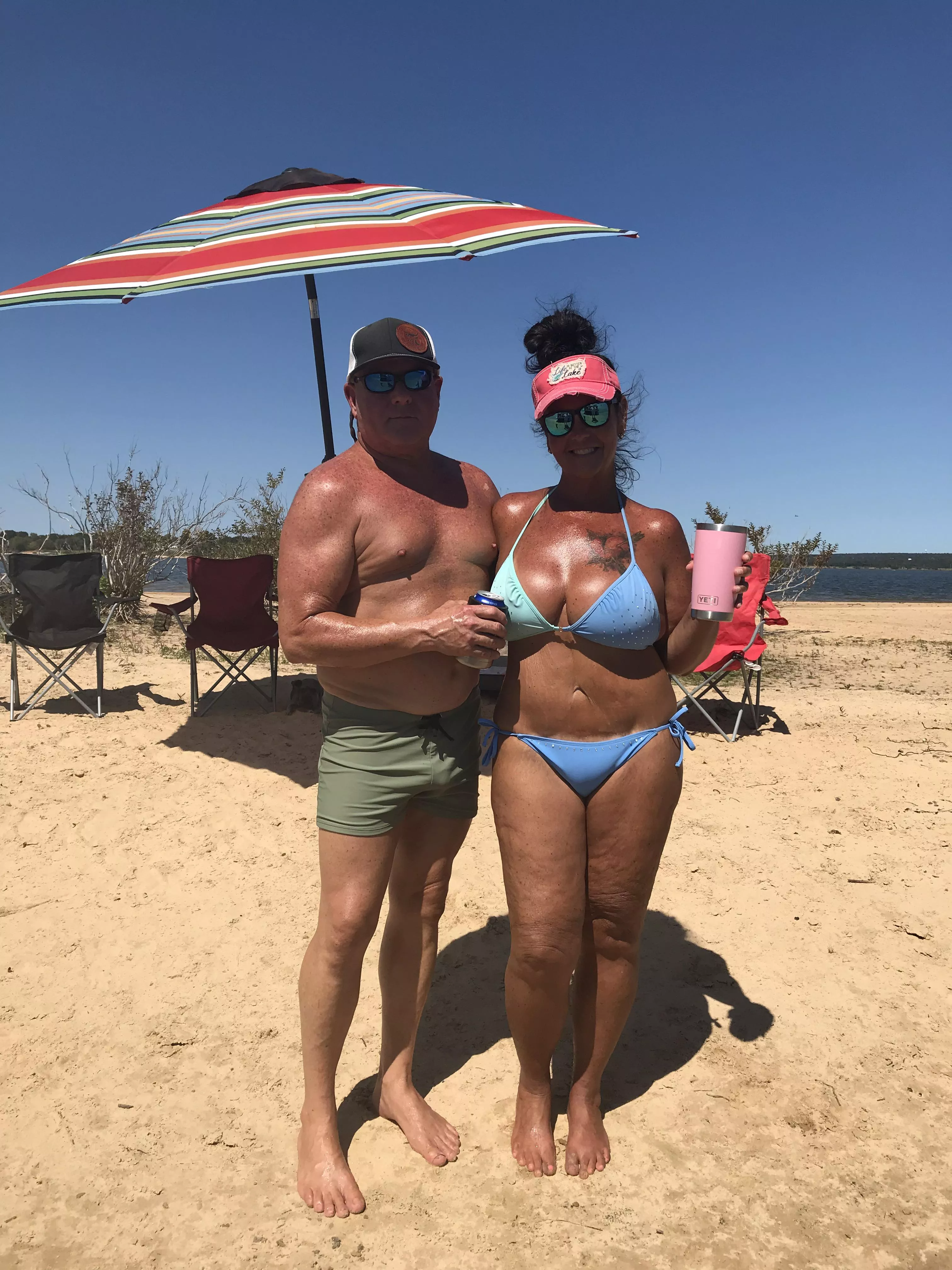 Hubby and I at our Lake Home.  posted by Okeufaulacpl