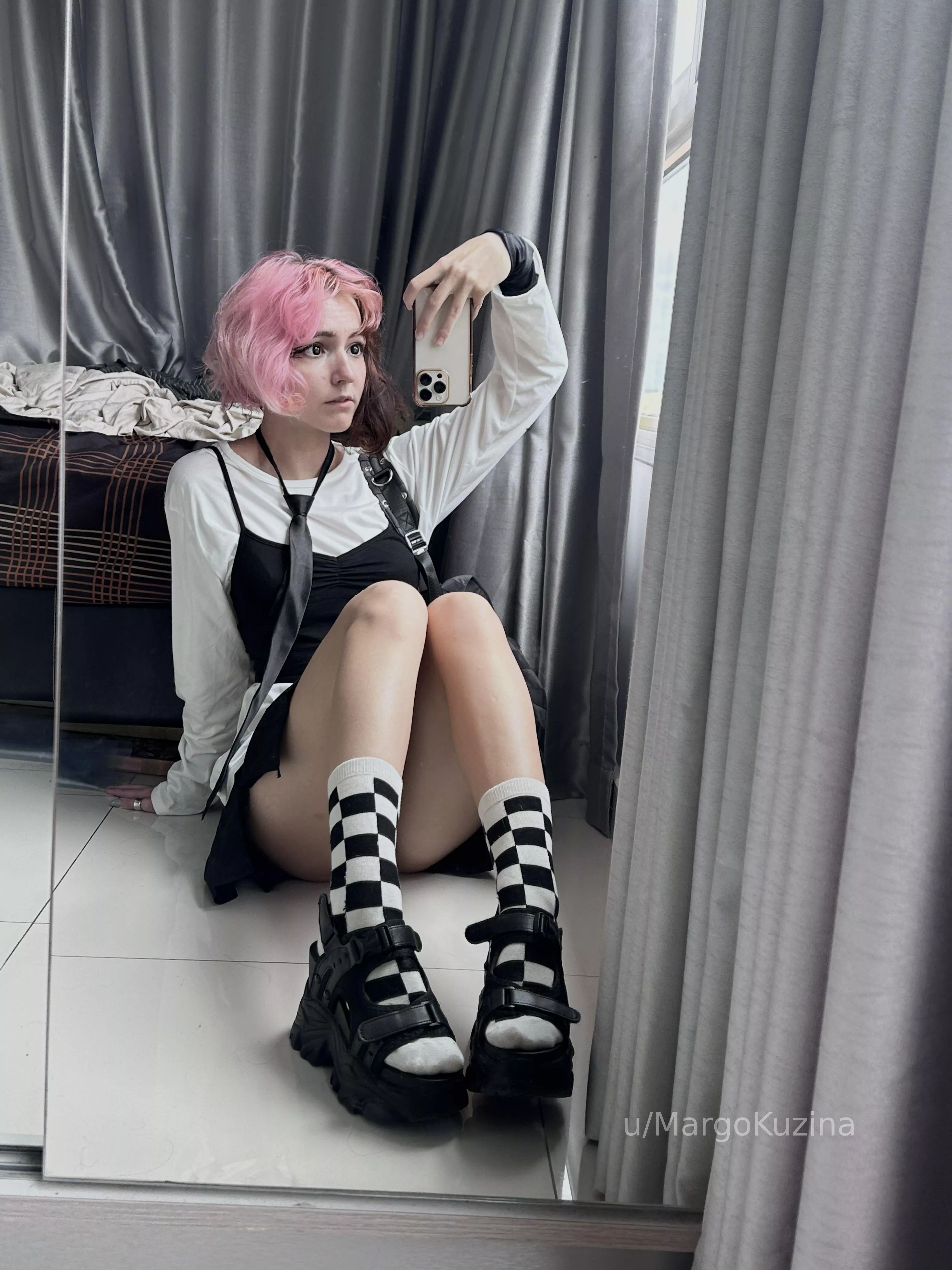 pink-haired figure on a chessboard posted by MargoKuzina