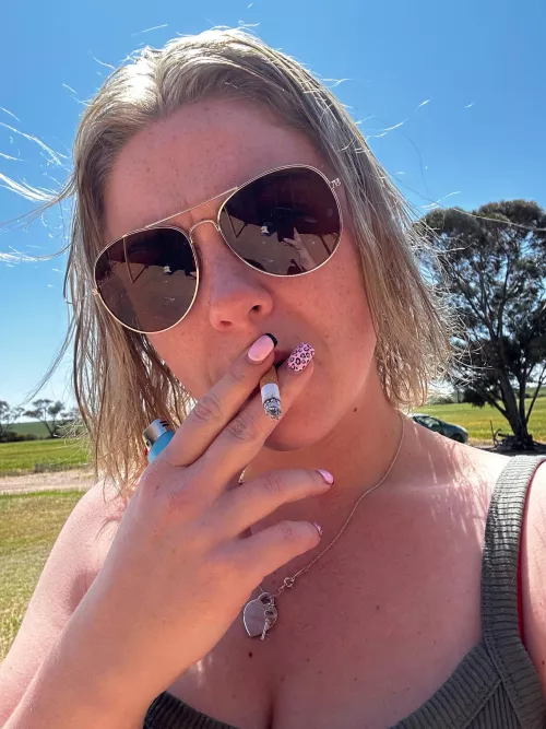 Beautiful day to enjoy a smoke outside  by mariejanelane