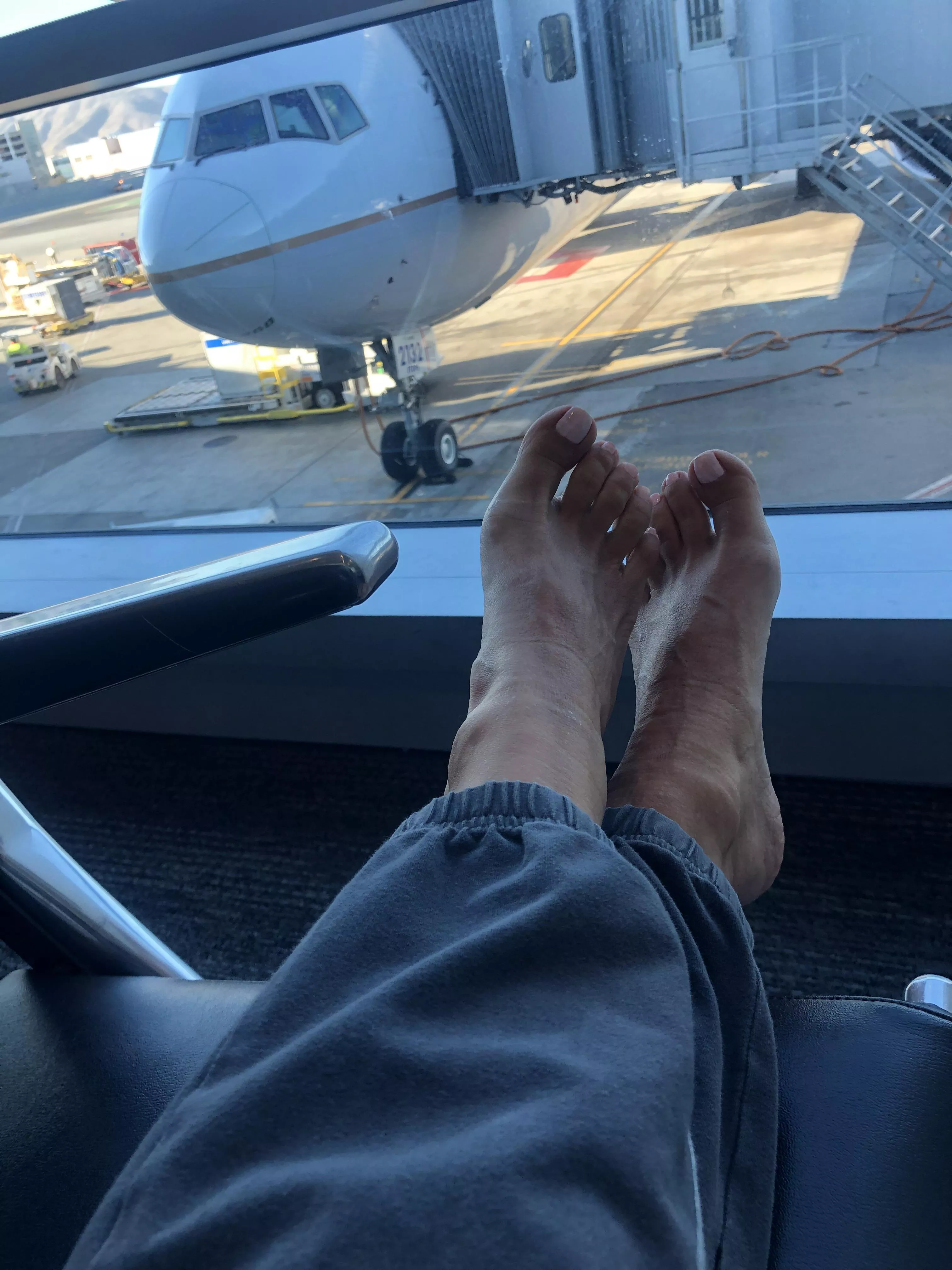 My feet at the airport. Would you take a look? posted by albastoes
