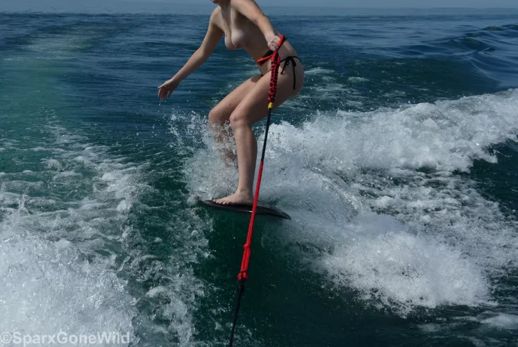 Pierced and surfing by sparxgonewild