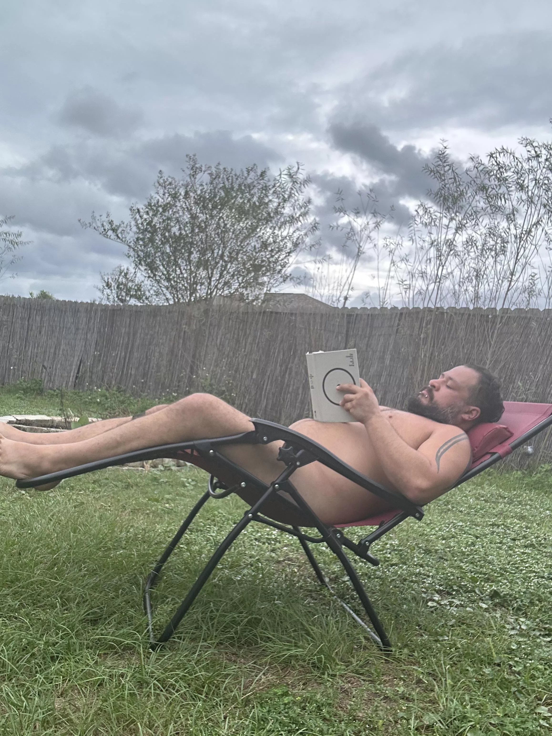 Overcast days are for catching up on some reading in the backyard.  posted by Affectionate_Fly9259