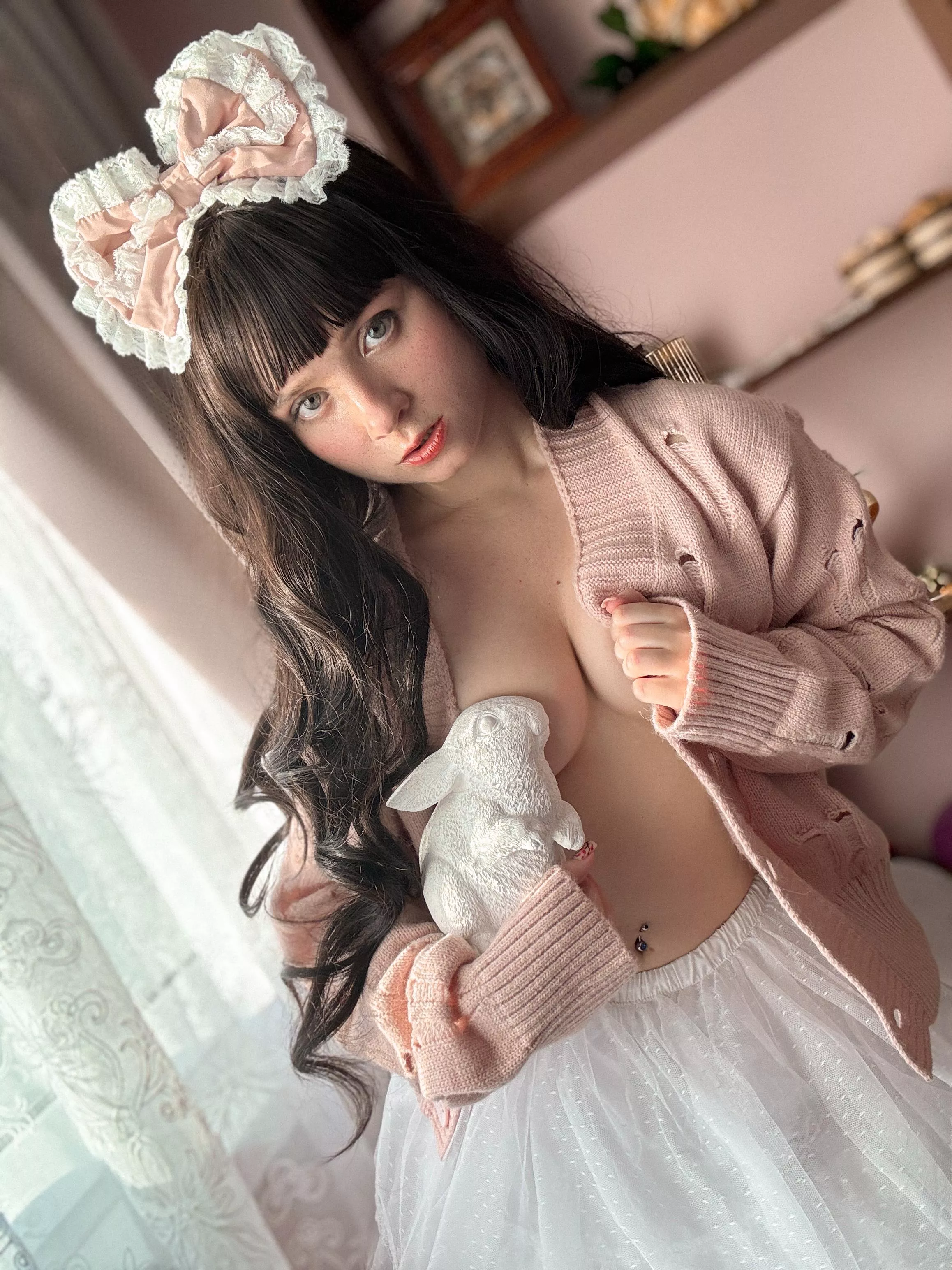 A long hair girl and a white rabbit.. posted by TatyanaVikernes