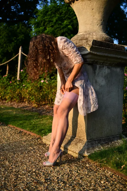 adjusting my garter belt in the park OC by MalinaWhispers