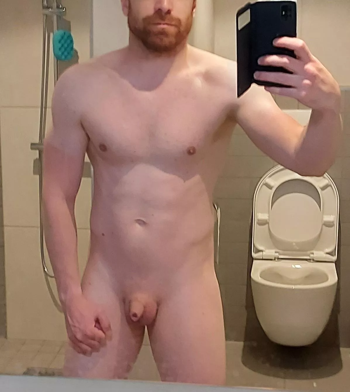 I'm a young guy showing off my muscles and what's between my legs posted by Used-Independent7342