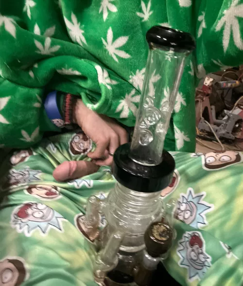 Smoking a few rips off the bong while someone wants to peek there head out heheh  by Relevant_Way3392