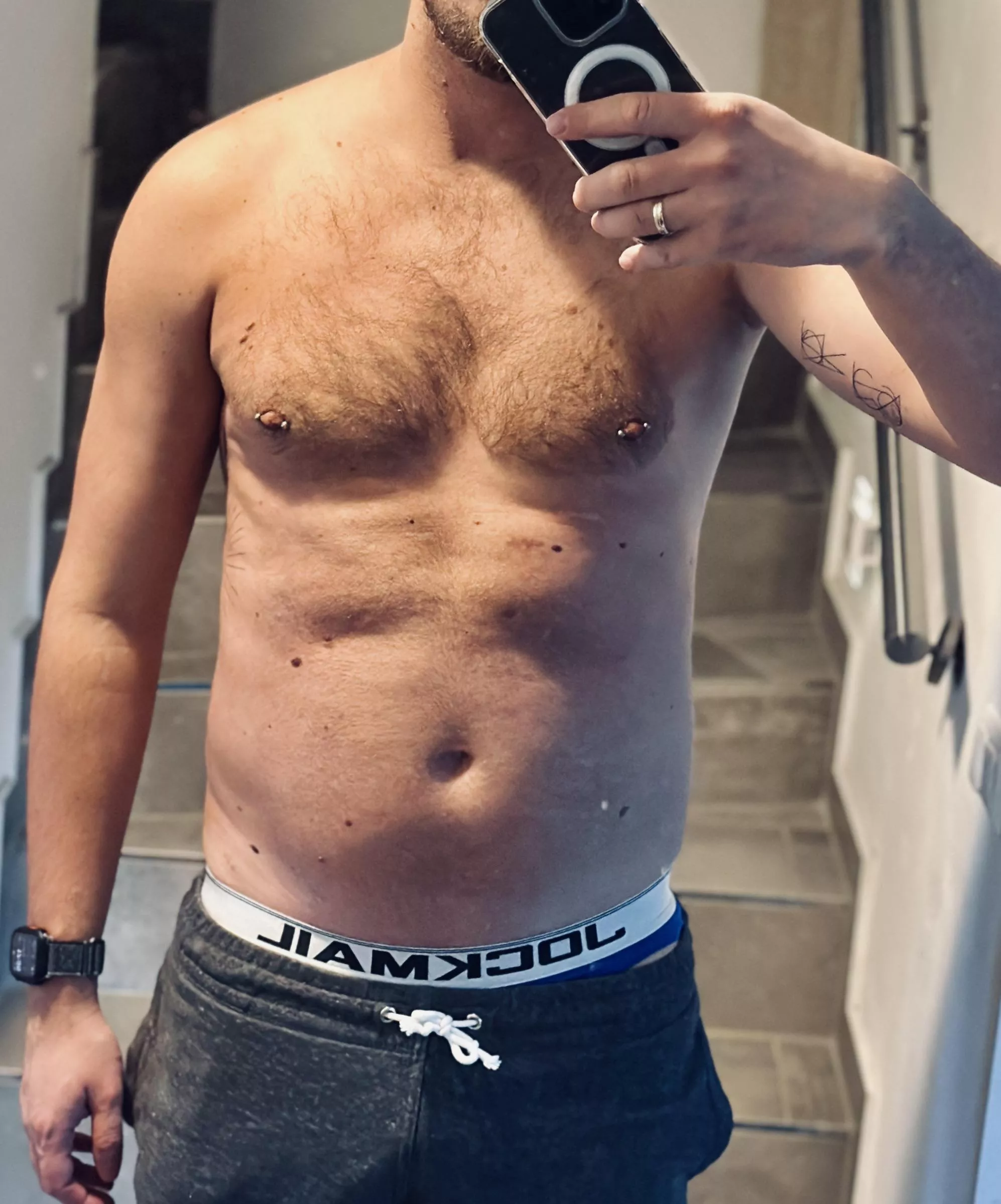 Pierced, tattooed, hairy  posted by straightNbi