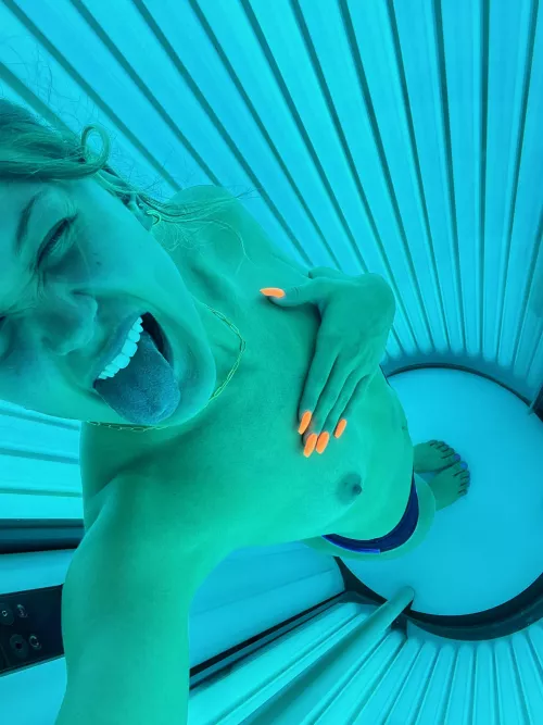 One boob and a naughty tongue. by snowbunbail