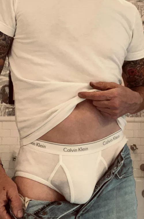 White t-shirt, button fly jeans and CKs. Great combo! by WhiteBriefsShowoff