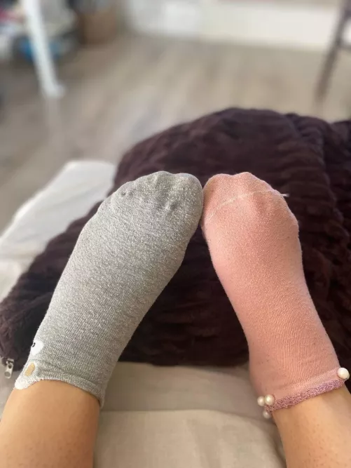 It's a tough choice between pink socks and gray socks by NoTrade2614