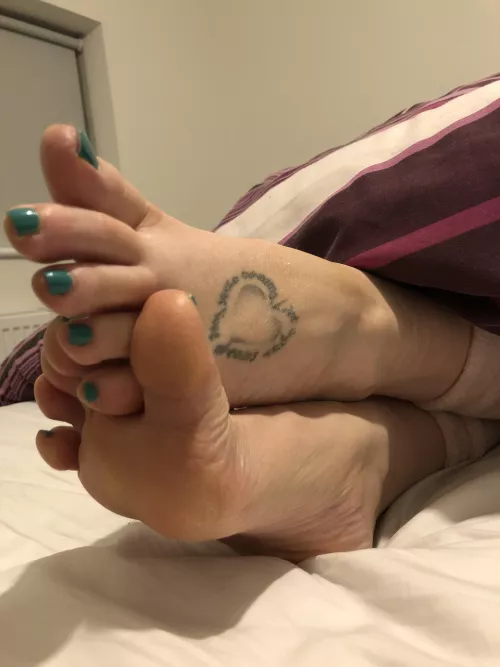 My long toes hanging out the duvet  by catesprettysoles