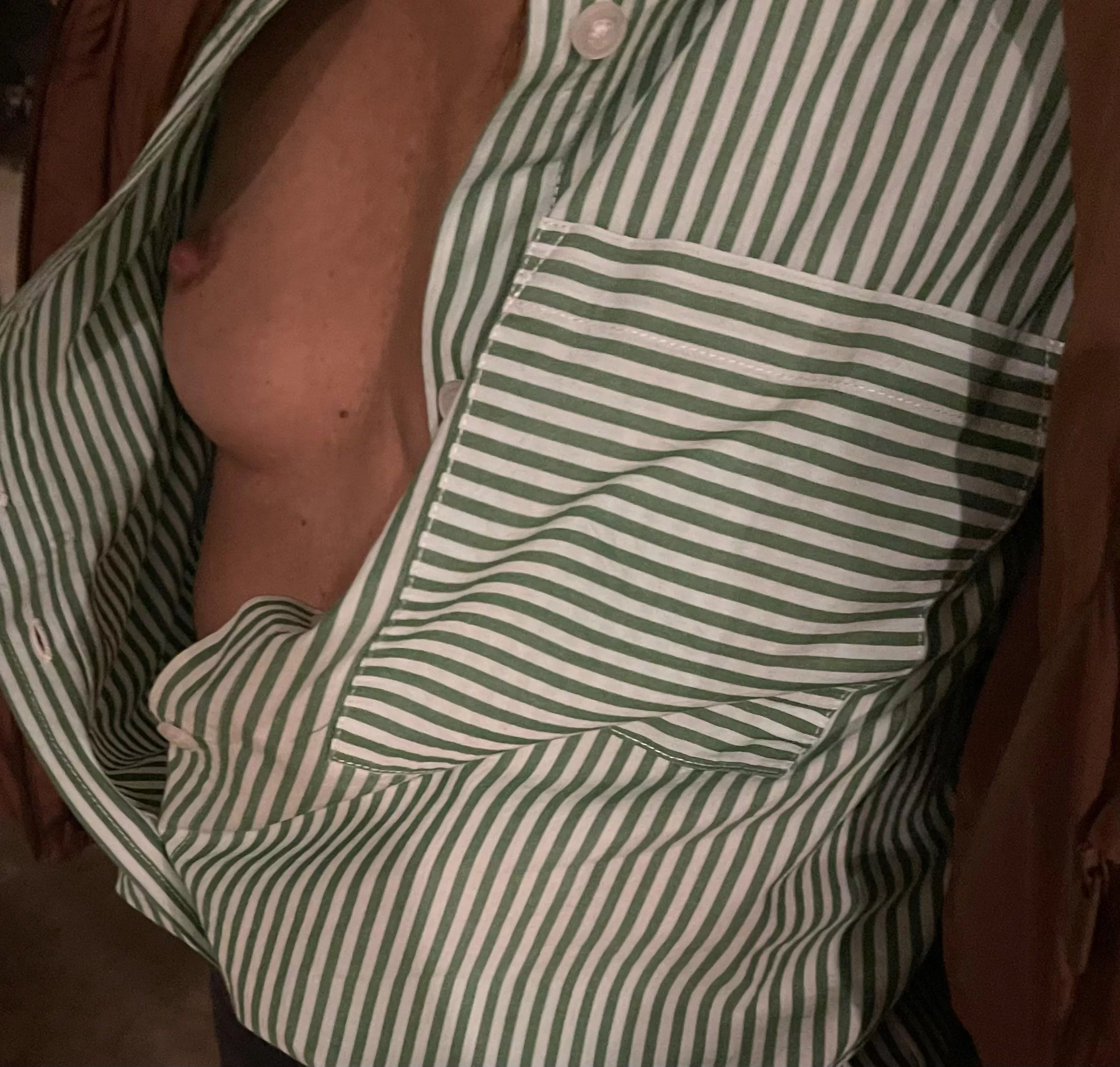 My wife shirt was open watching MNF at the Sports Bar.  posted by toy11