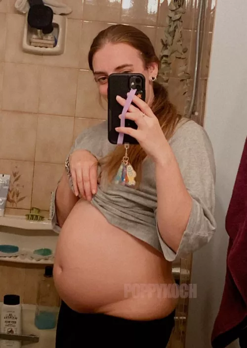 Stuffed to my MAX! I don't think a baggy t-shirt is going to hide this 🤭 by PoppyKoch