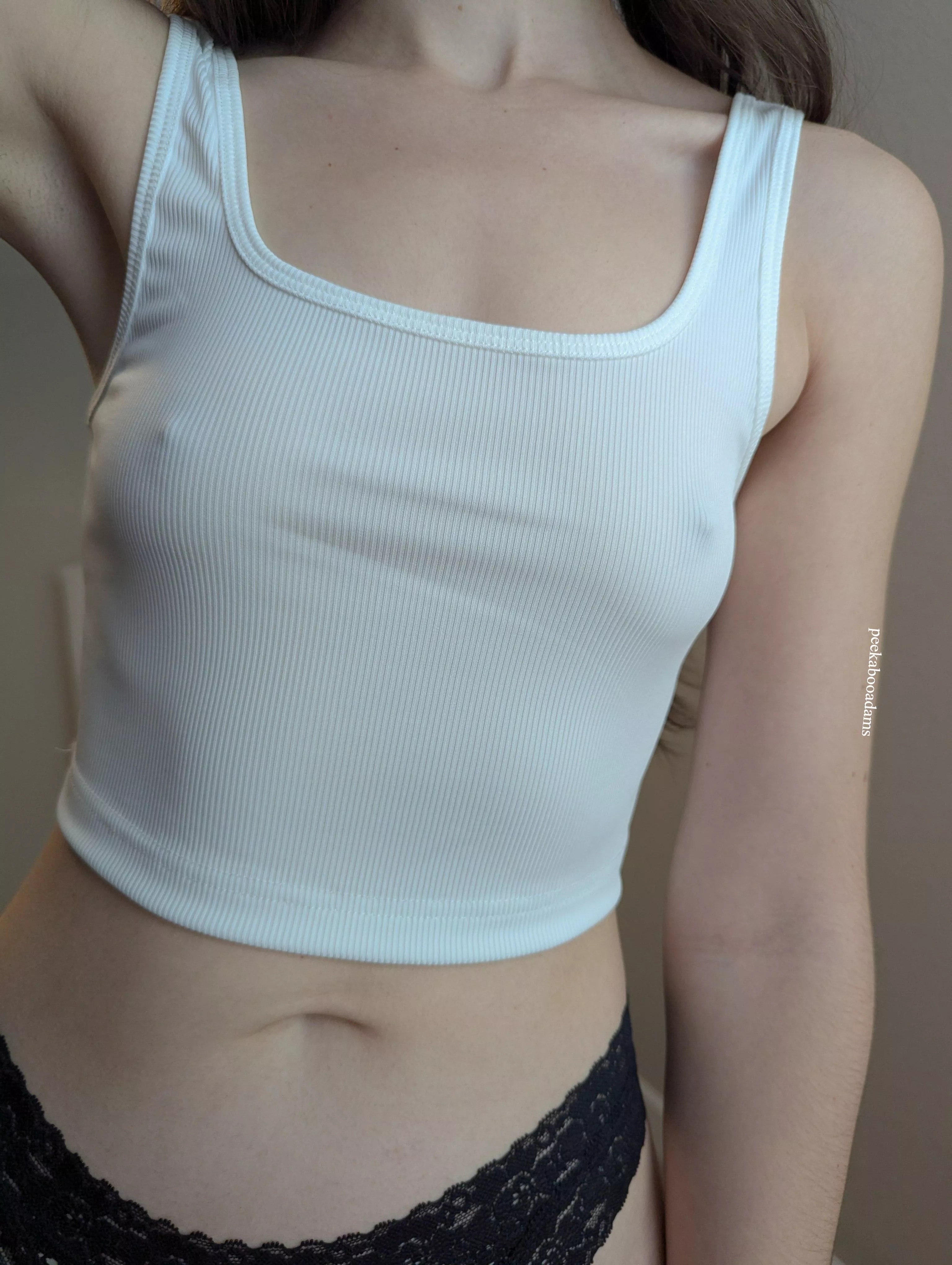 Plain white tank tops never get old posted by peekabooadams