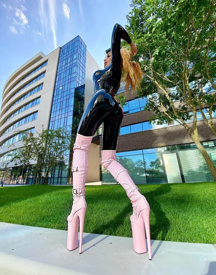Black latex and pink boots posted by Goddess_Slavena