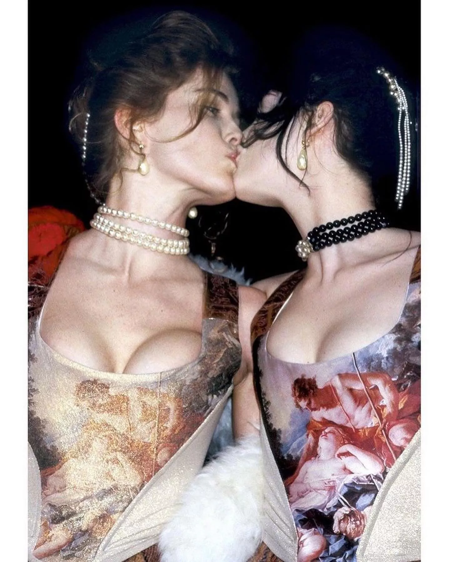 A kiss between ladies posted by magicaldanger