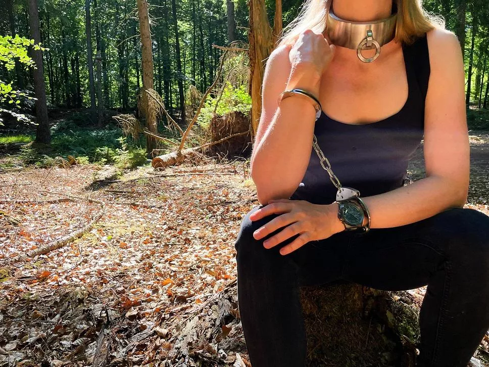 Left the keys to my cuffs and collar in the car and walked as far into the woods as I dared before turning around... posted by JessicaShackled