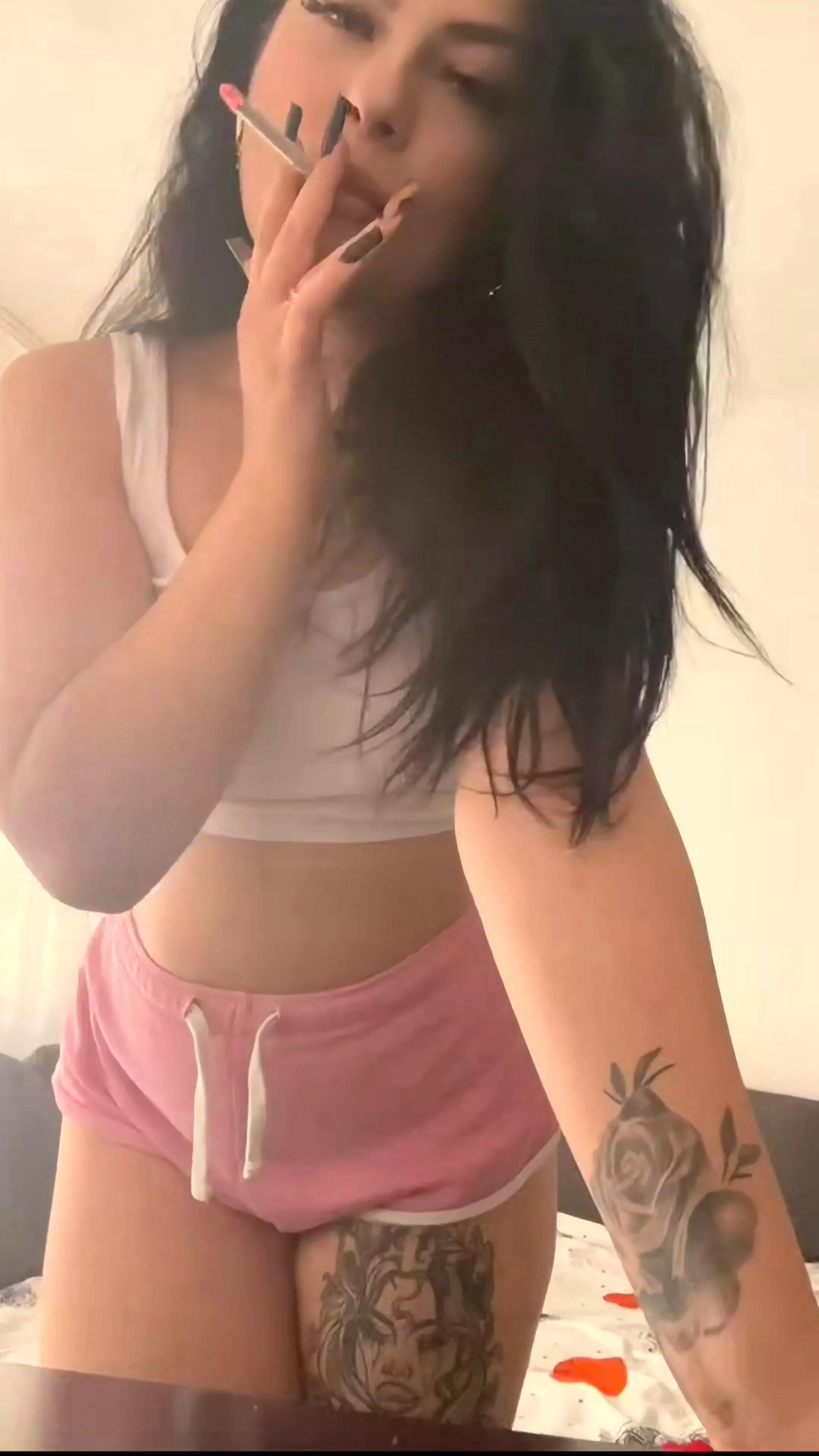 Lounging around the house enjoying my cigarette. posted by Marissa0805