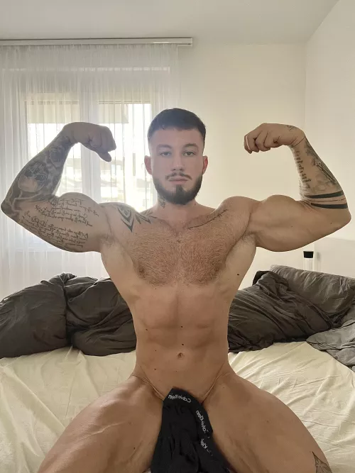 Using my muscles to seduce. by Key_Relationship2460