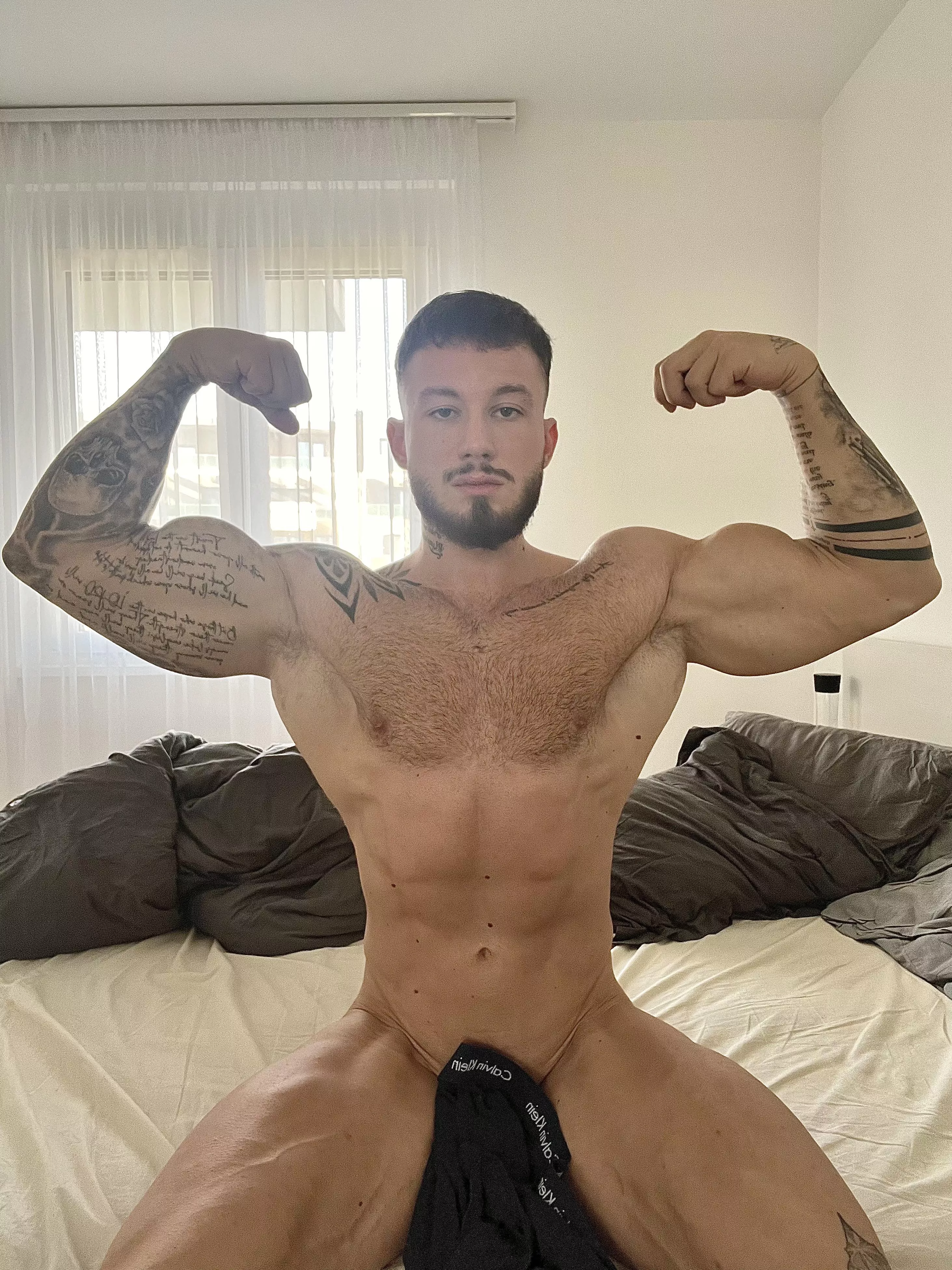 Using my muscles to seduce. posted by Key_Relationship2460