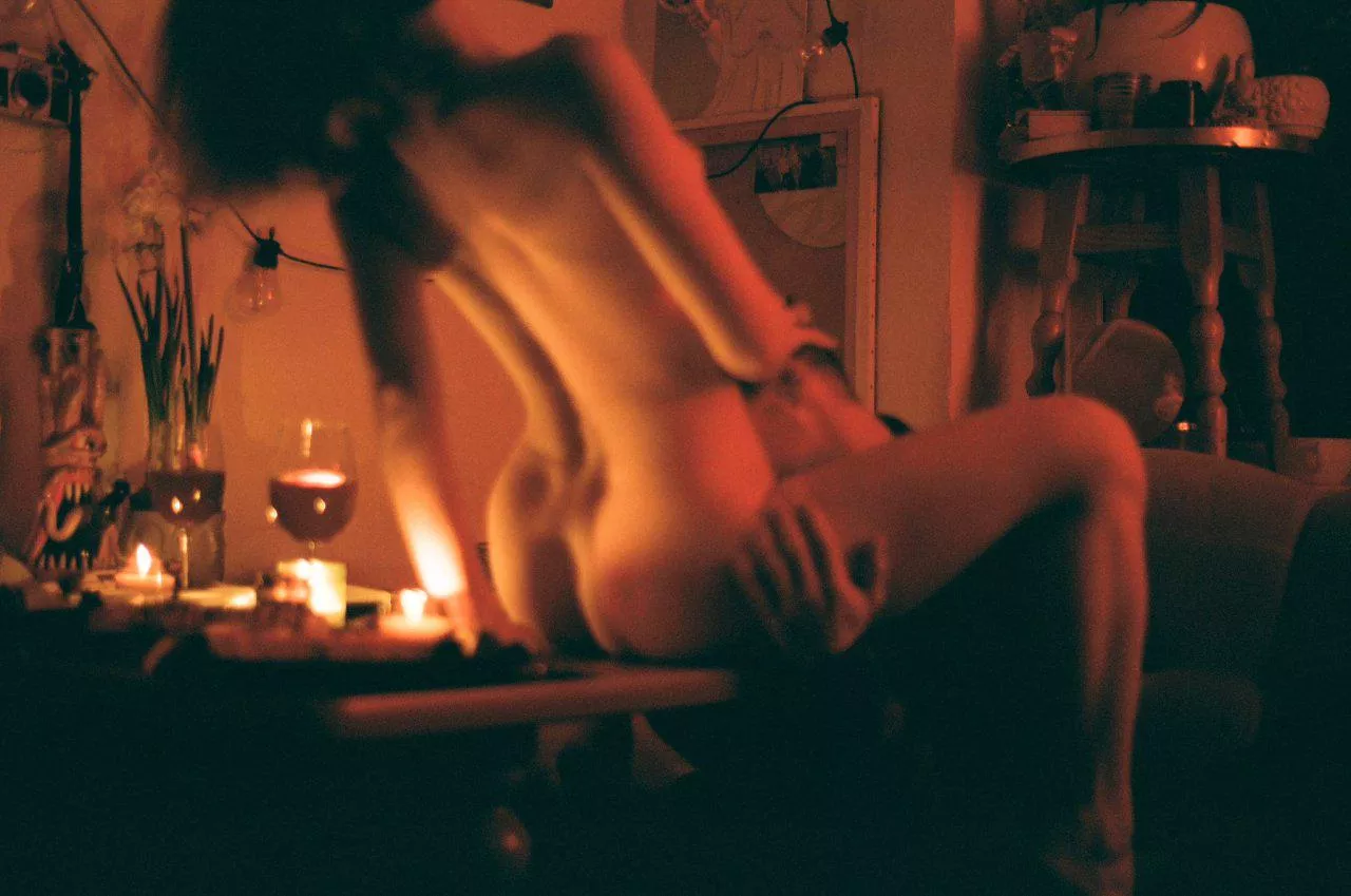 A lovely red, a cozy dinner...candlelight and a handsome boy to attend to all my needs. Who says it can't be romantic? posted by SurfFly