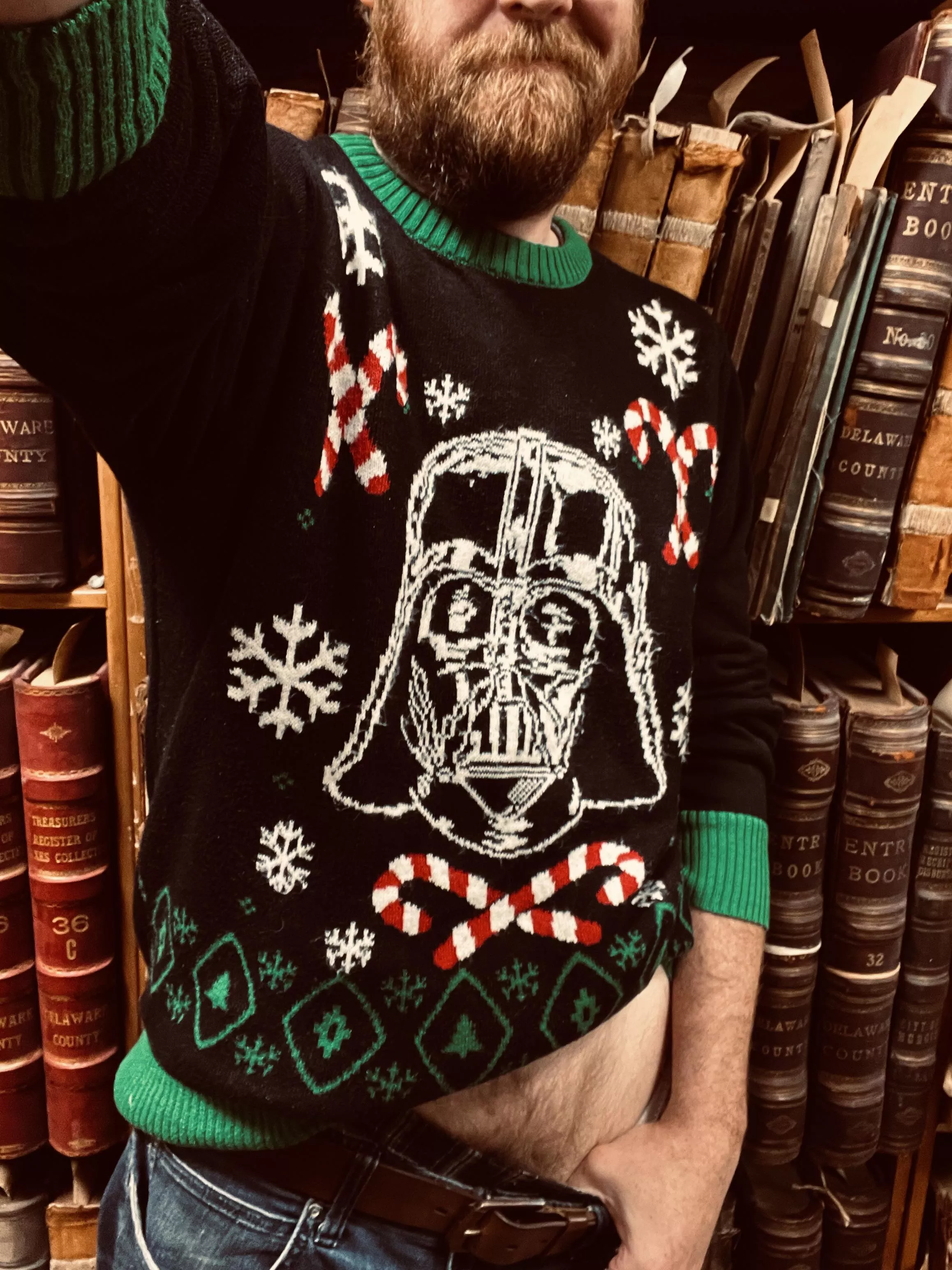 Standing in front of a bookshelf at work. Is this acceptable? posted by JeanLucPecan