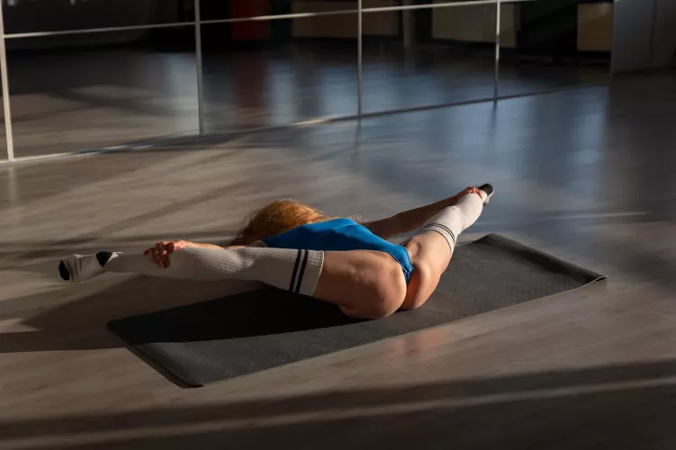 stretching in my high knee socks by flexibleflow