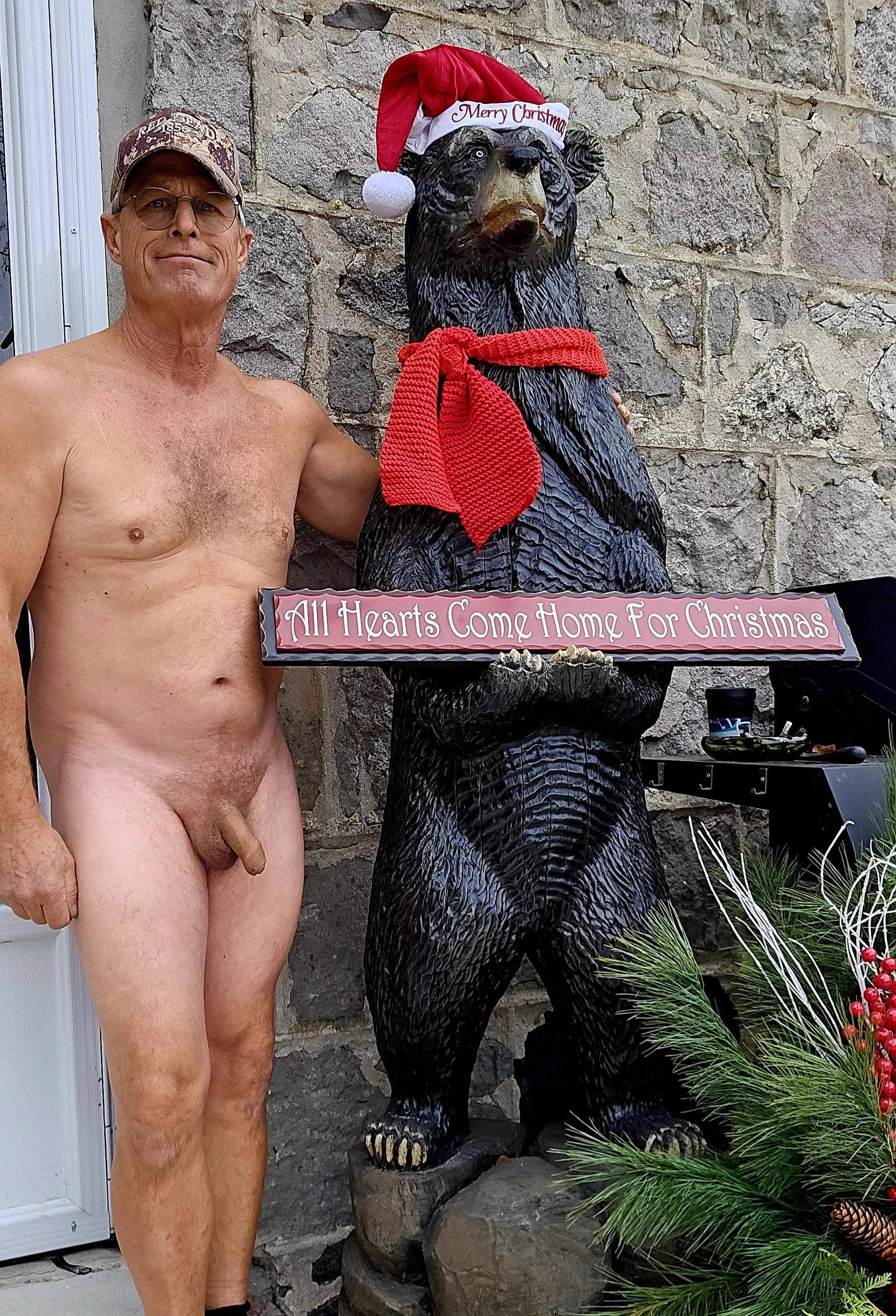 Got a pic with are Christmas bear before the snow came  posted by Cultural-Ad7099