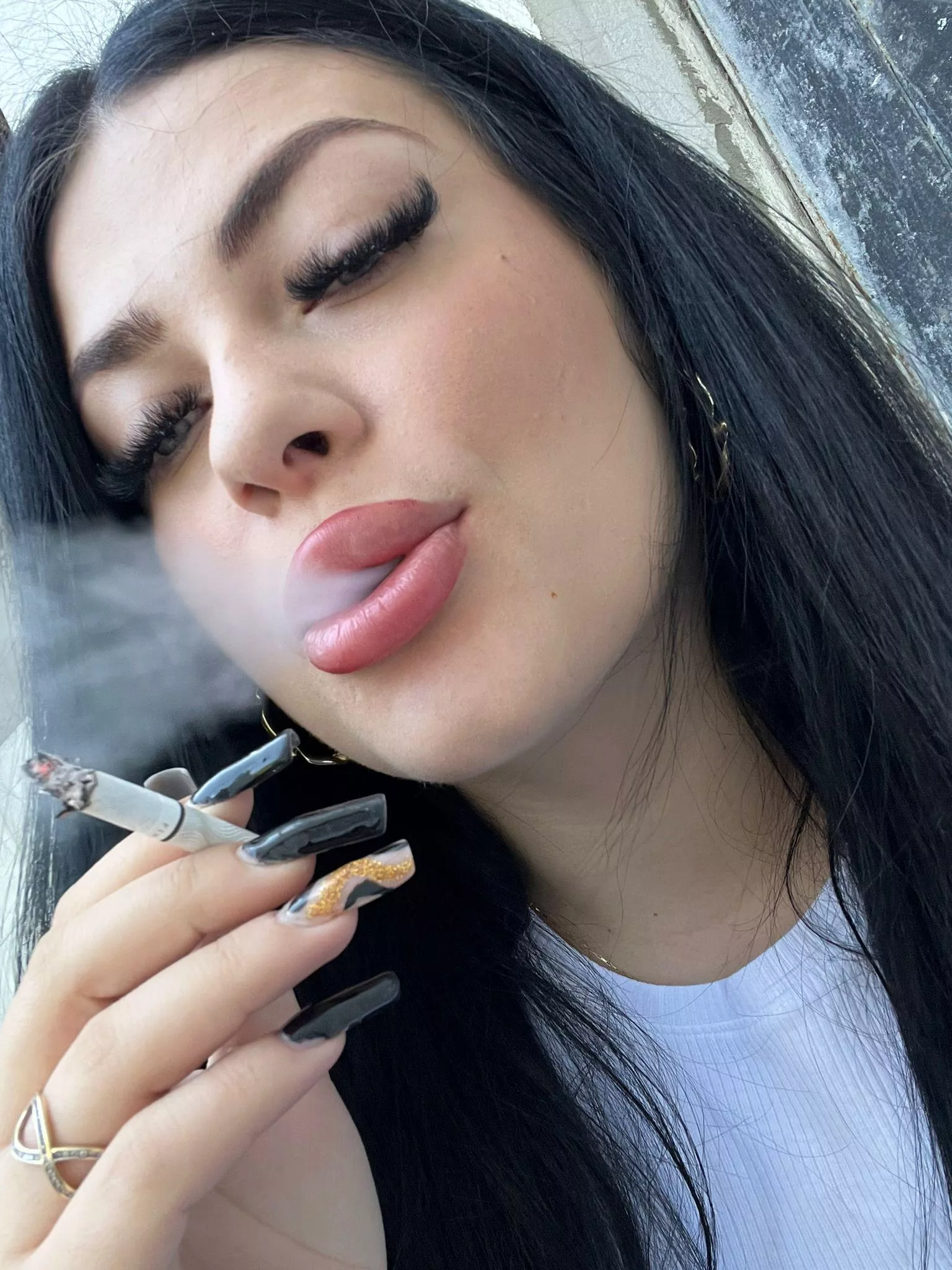 My cigarette is almost gone. Should I light another one? posted by Marissa0805