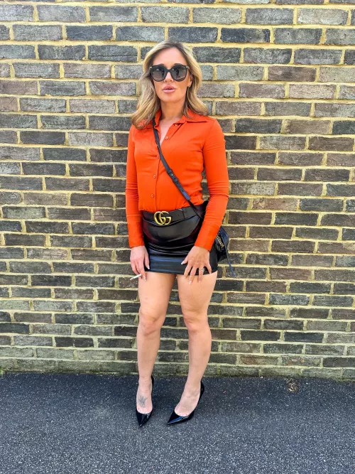 Outside the pub, stealing the spotlight one puff at a time. by Realsmokinghousewife