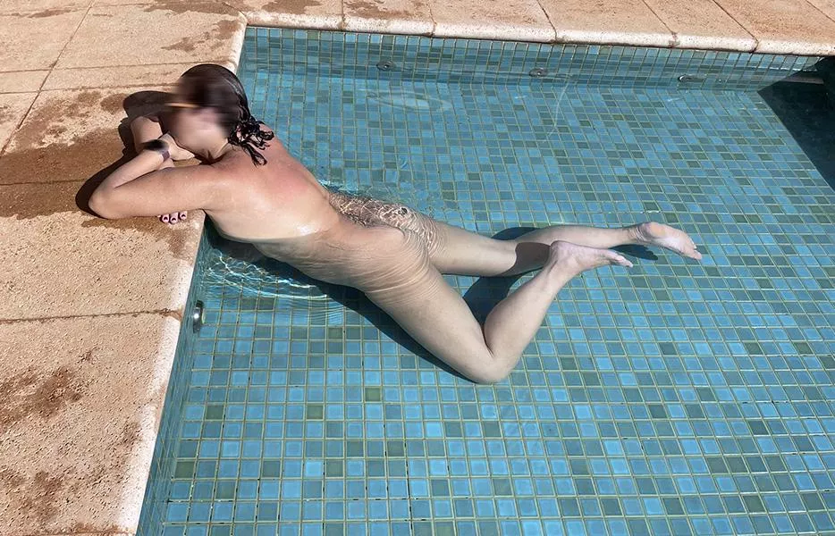 Sunbathing and relaxing naked by the pool. This feels amazing posted by Moadib51