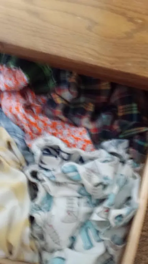 Identify AE? Took this picture of my bros underwear drawer a while back, trying to identify the American Eagle boxers within, on top was a pair, white with a screw and either a magnet, or horseshoe? Also the yellow looking ones, and orange looking ones.  by Infamous_Pay