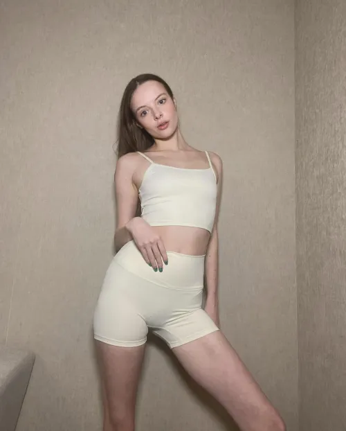 I like the way my slender young pale body looks in tight shorts and a short top by heretomess372