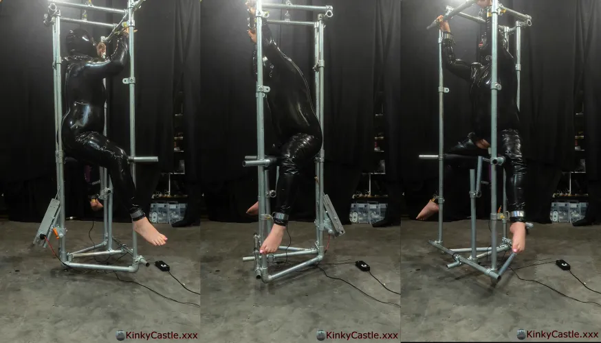 Latex doll padlocked to a spinning frame, rotated while being fucked and vibed. [OC] by Ash_577474