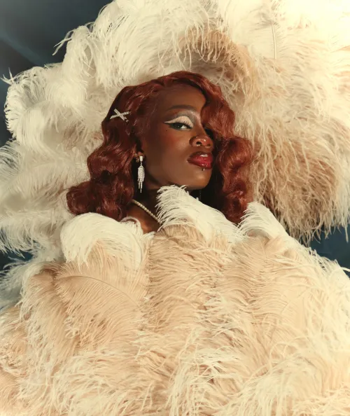 Drag queen getting into burlesque- First feather fan photoshoot! by Much-Butterscotch193