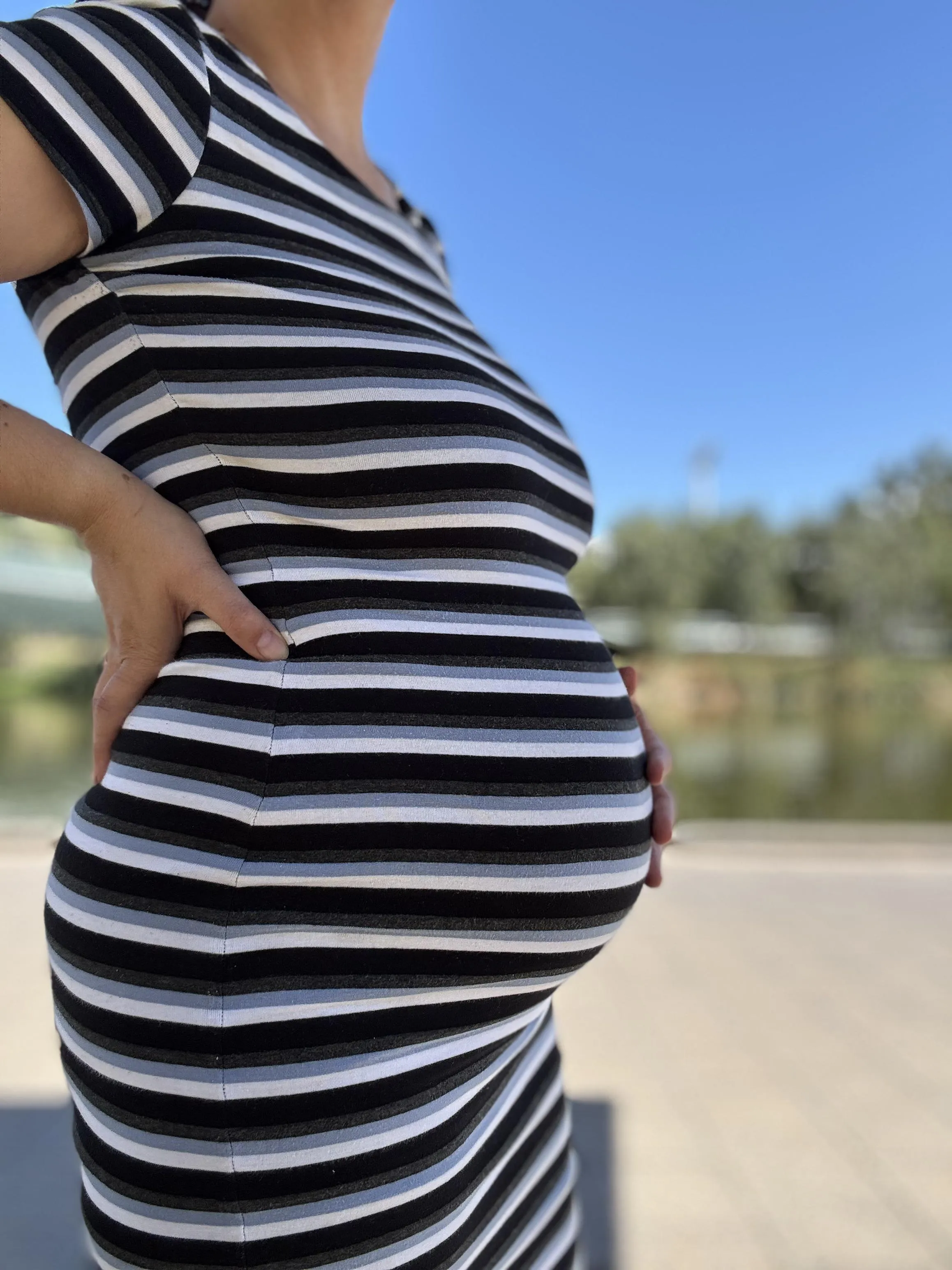 My bump and I enjoying the warm weather. Would you like to go sun bake with me? posted by SeraphinaStorm