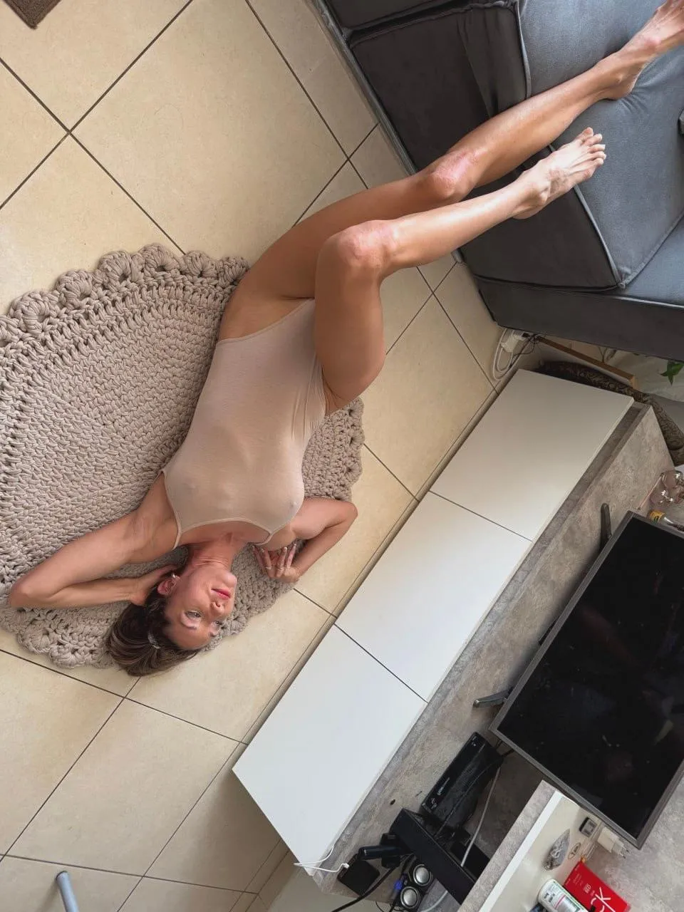 Stretching out in this one-piece suit makes me feel like a magazine model. posted by adorable_liv