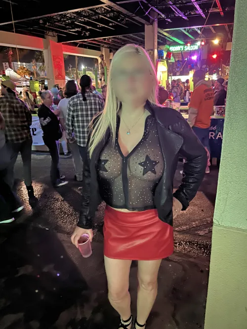 Teasing on Main street at Daytona Bike Week in my tiny red leather microskirt and sheer Black Blouse [image] by hotwifeshowoffxxx