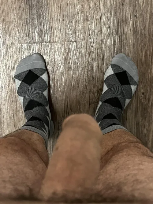 (47) Hey boy, take Daddy’s socks off and put that cock in your mouth. by RubDadsFeet