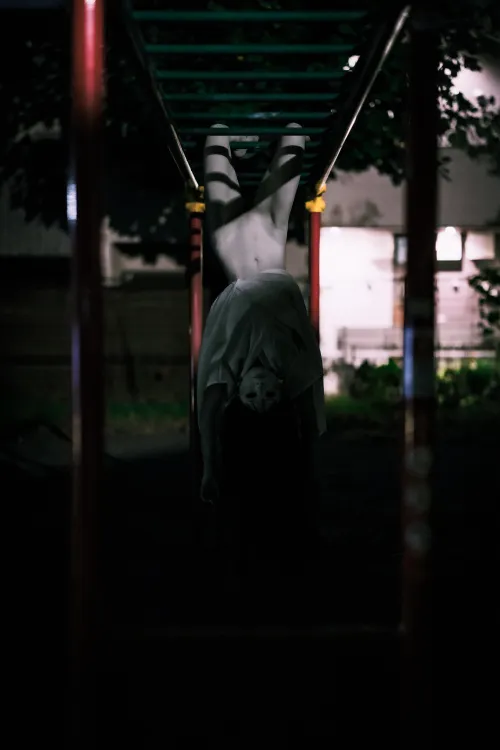 A girl on the monkey bars. by bpii_photography