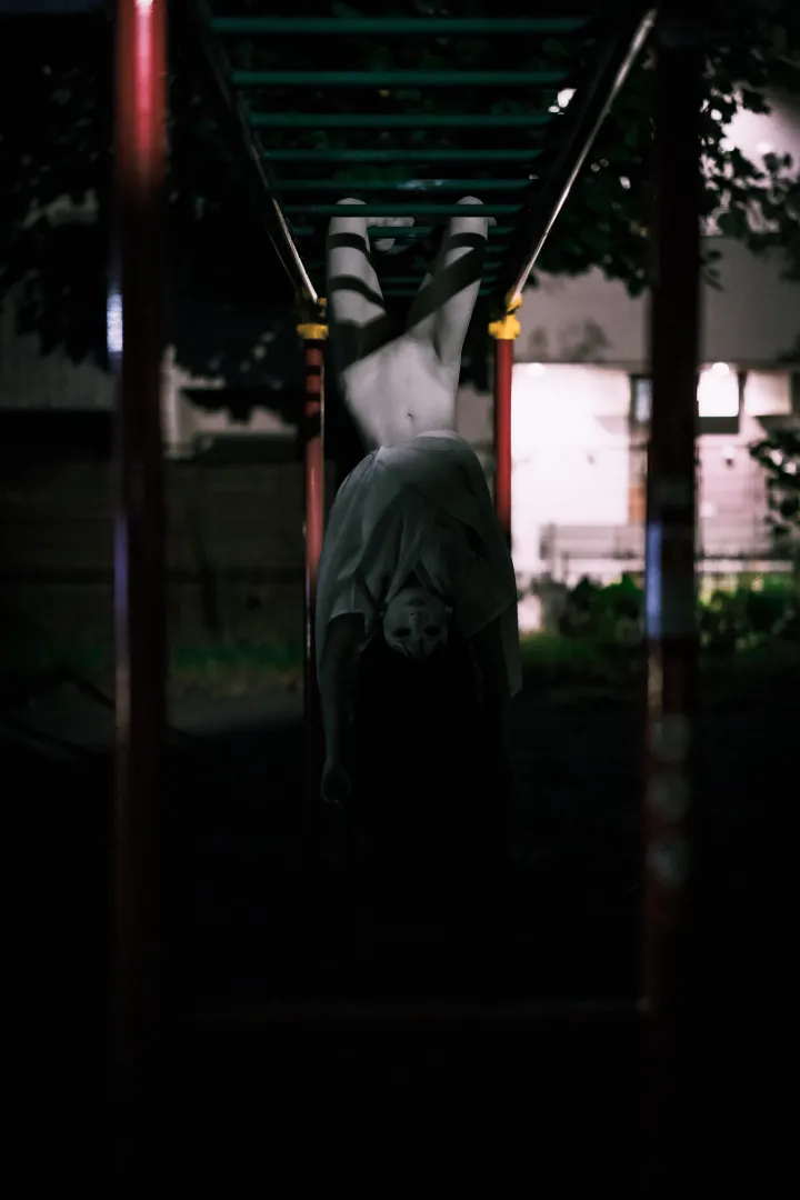 A girl on the monkey bars. posted by bpii_photography