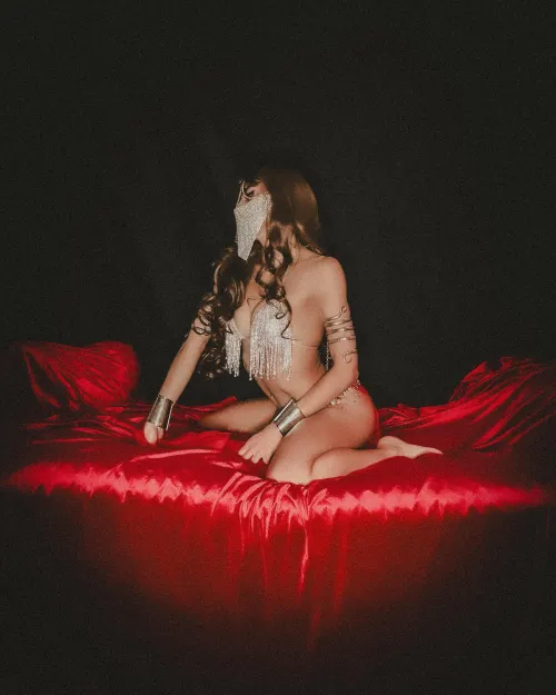 A masked beauty surrounded by flowing silk, blending mystery and elegance in a dreamlike scene by Belladancer_beauty