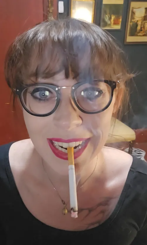 A pretty fuchsia colored lipstick to best dangle. I couldn't help but smile as I smoke by MistressThrope