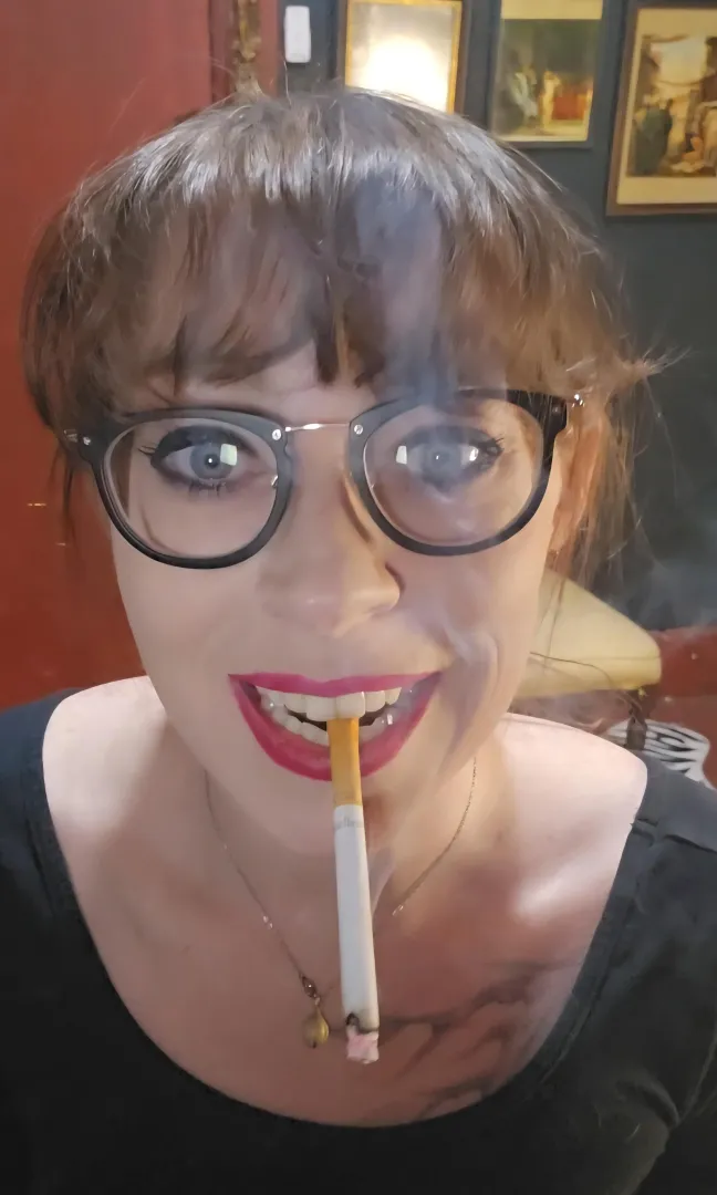 A pretty fuchsia colored lipstick to best dangle. I couldn't help but smile as I smoke posted by MistressThrope