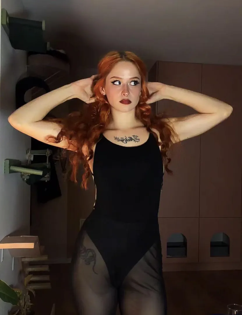 All black because red hair is the outfit posted by RedheadFairy03