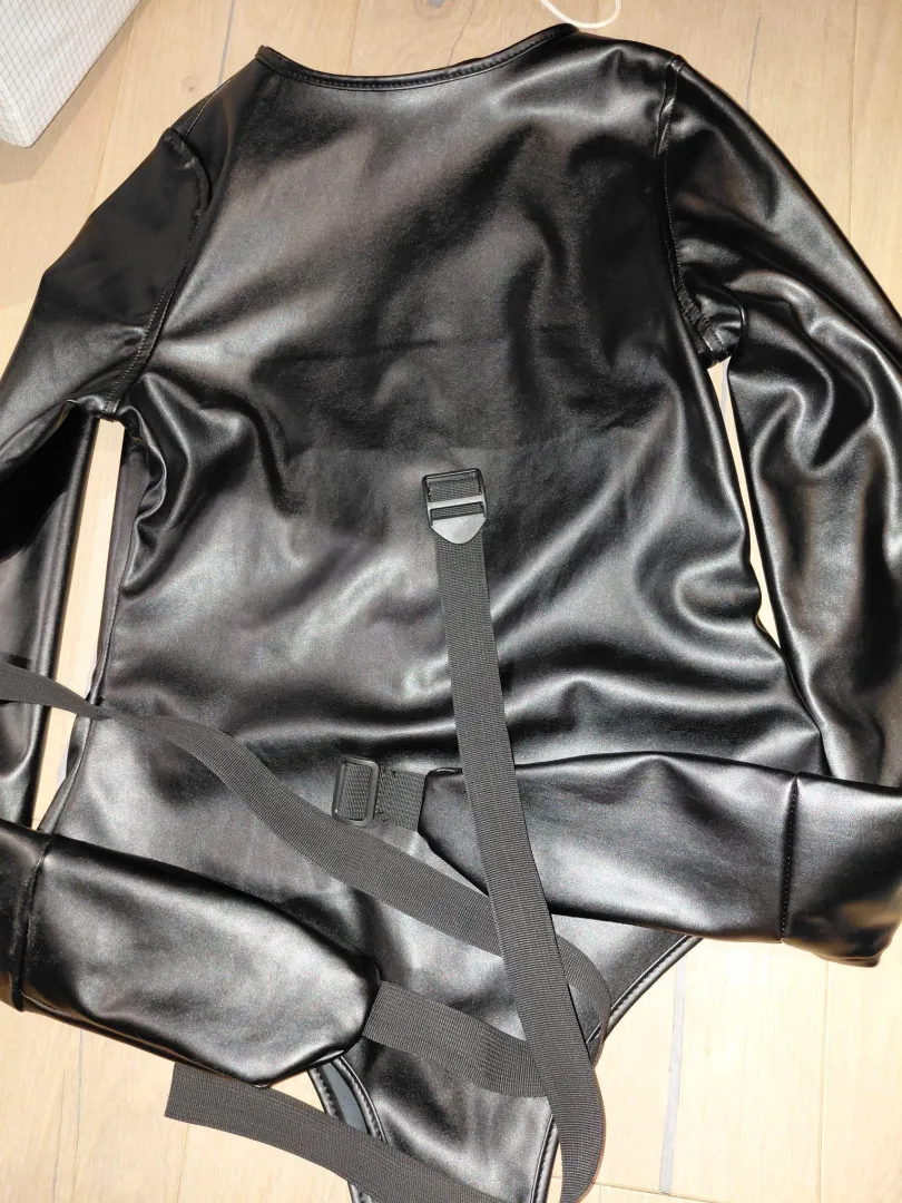 Any suggestions how i could make a selfbondage release mechanism for this straitjacket? posted by Nifler_107