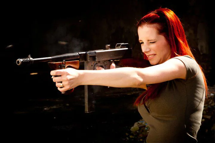 Ariel and the Thompson submachine gun... posted by hellcat335